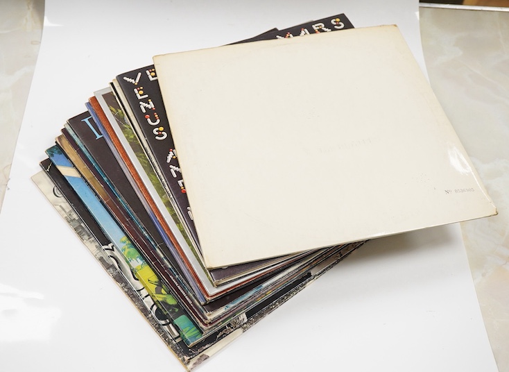 Seventeen LP record albums, including a stereo The Beatles ‘White Album’, top loading cover with one black inner sleeve (one missing), no. 0536905, together with artist including; Wings, the Byrds, the Carpenters, John L